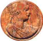 Jeton de jeu en ivoire inscrit avec un portrait du frère de Cléopâtre Ptolémée XIV Philopator II. Source : wiki/Ptolémée XIV/ domaine public