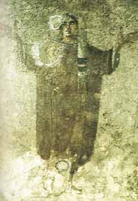 Mélanie dite l'ancienne ou sainte Mélanie, Prière (détail), catacombes de Priscille, cabine de la velatio, Rome (milieu du IIIe siècle). Source : wiki/Mélanie l'Ancienne/ domaine public