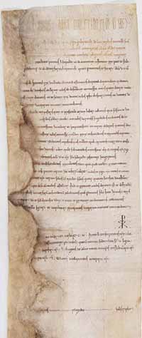 Diplôme en latin de 1111 par lequel le roi Louis VI, après avoir fait prisonnier le seigneur du Puiset, fait raser son château et abolit les coutumes établies par ce seigneur sur les terres de l'abbaye de Saint-Denis. Archives Nationales.